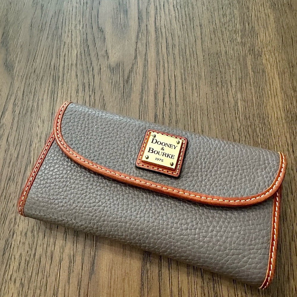 Dooney & Bourke Pebbled Leather Wallet with Brown Trim